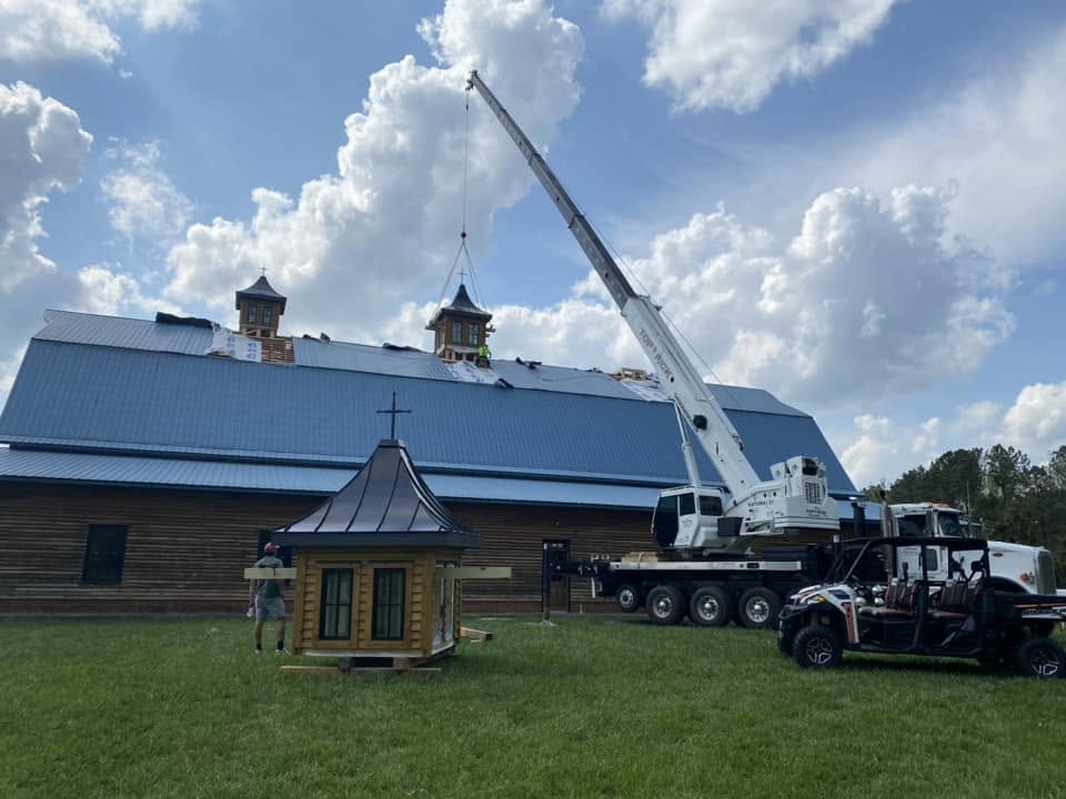 setting a cupola on church roof with crane